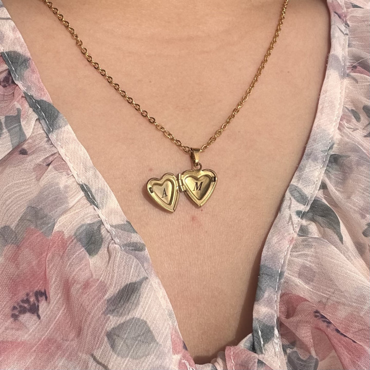 Dúo de relicarios mini corazón